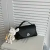 Bolso de diseño nicho transfronterizo para mujer, bolso de hombro y cruzado casual de moda, nuevo bolso de mano personalizado primavera 2026