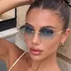 Novos óculos de sol sem aro com corte a laser, estilo europeu e americano, óculos de sol redondos da moda de alta qualidade, óculos de rua únicos e versáteis