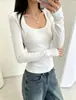 El artículo de moda popular para mujer de este año es el nuevo diseño de otoño 2026, camiseta top básico de manga larga con cuello en U de retazos
