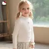 Camiseta Básica de Terciopelo Alemán para Niñas Otoño e Invierno 2025 Nueva Dulce Cuello Medio de Tortuga Cálida y a Cuadros Tops para Bebés Venta al por Mayor