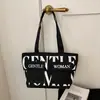 Nuevo bolso de hombro de nicho para mujer, bolso tote casual de gran capacidad, bolso de axila moderno y versátil, bolso de mano estilo coreano