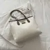 Outono de 2026 Nova Bolsa Tote Casual Elegante para o Trabalho Texturizada Simples Estilo Coreano Bolsa de Ombro Bolsa de Braço