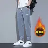 Calças Jeans Masculinas Outono e Inverno Forradas com Lã 2026 Novo Estilo Jogger Harem Casuais Longas Calças de Inverno Masculinas Engrossadas