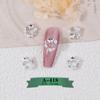 Adornos para uñas de corona de Navidad nuevos transfronterizos estrellas brillantes lazo taladro de uñas tridimensional metálico fabricantes venta al por mayor