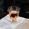 Venta al por mayor de fábrica Cafetera de té de vidrio de borosilicato alto alta transparente Taza creativa de origami uniforme Taza de té Kung Fu para el hogar Taza de feria