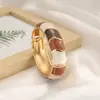 Bestseller transfronteiriço na Europa e América: Pulseira de design irregular em blocos de cores esmaltadas retrô criativas com design de bambu ondulado boêmio