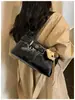 Elegante bolso retro para debajo del brazo para mujer, nueva colección 2026, de alta calidad, bolso de hombro versátil, bolso de mano de moda para mujer