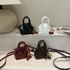 Bolsa Mini Estilo Coreano Nueva Primavera Bolso de Hombro Cruzado de Moda Bolso de Concha Simple y a la Moda
