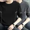 Temporada de primavera y otoño, camiseta lisa de manga larga popular, corte holgado, cuello redondo, camiseta interior para hombre, top simple y versátil