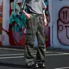 Jeans de trabajo estilo americano con camuflaje urbano para hombre, pantalones holgados de pierna ancha con pliegues, multibolsillos, retro, con vibra veraniega.