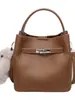 Bolso retro de moda para mujer, nuevo modelo primavera 2026, bolso de hombro y cruzado casual versátil de alta gama