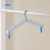 Perchero plegable Haiying con pinzas para secar ropa, portátil para viajes de negocios, viajes, estudiantes de dormitorio, perchero retráctil multifuncional