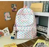 Mochila de Lunares de Alto Valor Estético para Mujer Modelo Nuevo 2026 Mochila Escolar de Gran Capacidad para Estudiantes de Secundaria y Preparatoria Estudiantes Universitarios Mochila para el Trabajo