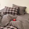 Juego de cuatro piezas de algodón lavado a cuadros retro Estilo japonés Sencillo Dormitorio Estudiante Algodón Transpirable Funda de edredón Juego de tres piezas