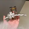 Pinza para el pelo coreana para mujer, pinza de tiburón de estilo simple, pasador de alta gama, pinza para la parte trasera de la cabeza, pinza de hueso de dragón con lunares