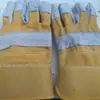 Luvas de soldagem de borracha amarela de fábrica, luvas de couro para soldagem, luvas de tecido amarelo de dois dedos, resistentes ao desgaste, resistentes a perfurações, isolantes térmicos, luvas de proteção para soldador