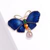 Broche de mariposa con perlas de aceite de aleación europea y americana, broche de ramillete de cristal de aleación transfronterizo, fabricantes de soportes vacíos