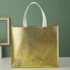 Fabricantes de bolsas no tejidas plegables de oro y plata con película de impresión a color, bolsas no tejidas, bolsas láser, bolsas de regalo