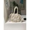 Mini bolso de mano con perlas para mujer, estilo coreano, con cadena, bandolera francesa, exquisito bolso pequeño tejido a mano con cuentas.