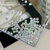 Decorações de arte para unhas redondas de zircônia com fundo pontudo brilhante, strass empilhados tridimensionais redondos multifacetados banhados a branco para decoração de unhas