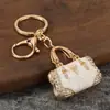 Llavero Creativo de Lujo con Bolsa de Goteo de Aceite y Pedrería, Colgante de Llave de Metal, Accesorio para Mochila, Llavero al por Mayor