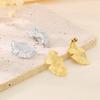 Rueda de cartas moda femenina exagerada cepillada hoja de loto aretes de acero de titanio personalidad forma de flor irregular joyería chapada en oro de 18 quilates