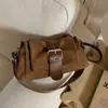 Colección de otoño 2026 transfronteriza: bolso de hombro con textura de cuero suave, bolso de mano delicadamente plisado, bolso cruzado simple y elegante para mujer