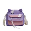 Bolsos cruzados de lona al por mayor para niñas, bolsos de hombro lindos y dulces, bolsos cruzados para estudiantes suaves y frescos