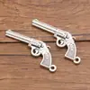 Una variedad de 2 colores DIY aleación joyería accesorios armas amuleto daga pistola granada colgante colgante