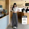 Pantalones de traje de mujer de alta gama a la moda con botones ocultos, nuevos estilos de primavera y otoño, adelgazantes, fluidos, de cintura alta, corte holgado, versión estrecha, pantalones de pierna ancha