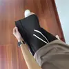 Nuevos Shorts Casuales de Color Sólido para Hombre Verano 2026 Decoración con Cremallera Estilo Callejero Versátiles Holgados de Cinco Puntos de Media Pierna