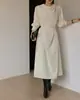 Nuevo vestido coreano chic de estilo francés de otoño temprano, de longitud media irregular, con un diseño elegante y detalle de lazo 18245