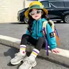 Chaqueta cortavientos con capucha de color liso para niña de comercio exterior, nueva chaqueta estilo coreano otoño 2026, abrigo para niños
