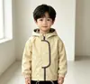 Chaqueta cortavientos con capucha para niños para primavera y otoño, unisex, con diseño de bloques de color, a prueba de viento, chaqueta con cremallera para bebés y niños pequeños, disponible en varios colores