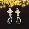 Venta directa de fábrica aretes de flor de tres pétalos con circón AAA Europa y Estados Unidos aretes exquisitos aretes de novia en stock lote mixto E6496