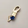 Directo de fábrica llavero de cuerda tejida accesorios de ferretería hebilla de herradura colgante para llave de coche accesorios de coche de moda