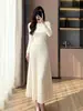 Vestido de punto gris estilo francés para mujer, nuevo modelo de principios de otoño, conjunto de vestido largo elegante para petite