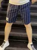Estilo Americano Retro Verano Nueva Llegada Pantalones Cortos Rayados Hombre 2025 Estilo Coreano Moda Urbana de Calle Secado Rápido Pantalones Casuales Ropa de Hombre
