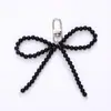 Nuevo Colgante Creativo de Cadena Colgante con Lazo de Perlas para Bolso, Funda de Teléfono, Llavero, Adorno, Exquisito Accesorio de Regalo Pequeño