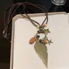 Collar de peluche de otoño e invierno para mujer, bonito y creativo suéter de dibujos animados, accesorios de alta gama, cadena larga para suéter.