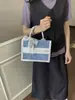 Nova bolsa de mão grande de ganga, moderna e elegante, com um toque de luxo, bolsa quadrada pequena casual com laço de pérola para mulheres