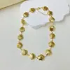 Moda de personalidad europea y americana serie marina acero inoxidable carcasa hueca tridimensional traje de collar y pulsera en stock venta al por mayor