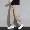 Atacado do Fabricante Calças Casuais Versáteis para Primavera e Outono para Homens, Calças Jogger Casuais de Perna Reta Soltas Estilo Hong Kong para Jovens