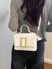 Bolso de mano texturizado transfronterizo 2026 nuevo de verano para mujer bolso vintage de alta gama bandolera con decoración de cinturón bolso cruzado