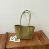 Bolso de cubo casual retro de gran capacidad para mujer, nuevo modelo de otoño 2026, bolso de hombro versátil y elegante