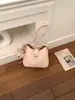 Bolsa transversal casual de nicho de design estilo coreano de alta qualidade para mulheres, nova bolsa de ombro elegante para o verão de 2026 para mulheres