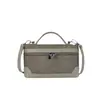 Bolsas pequeñas de color block populares este año para mujer 2026 nuevo bolso cruzado versátil de moda bolso de mano súper popular bolso cuadrado pequeño tipo caja