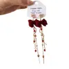 Pendientes de Borlas con Lazo Rojo 2026 Nuevo Estilo Caliente Lujo Ligero Gama Alta Pendientes de Año Nuevo Accesorios de Oreja Únicos de Nicho