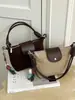 Bolso de axila de color liso de gamuza con diseño de nicho estilo coreano para mujer, nuevo bolso de hombro y cruzado de moda 2026 para el trabajo