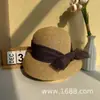 Nuevo sombrero de paja decorado con lazo para mujer, sombrero de sol versátil de ala ancha para salidas de vacaciones de verano en la playa